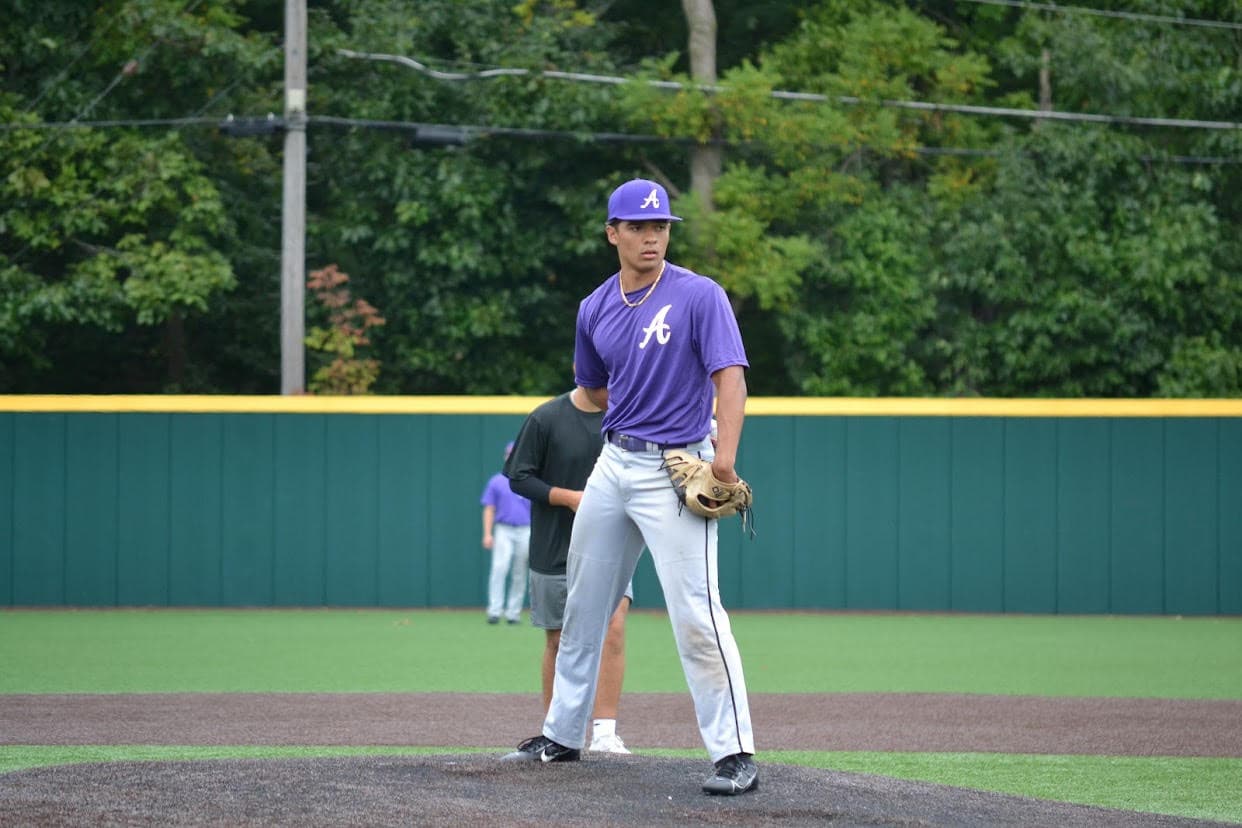 Cameron pitching during his baseball playing career